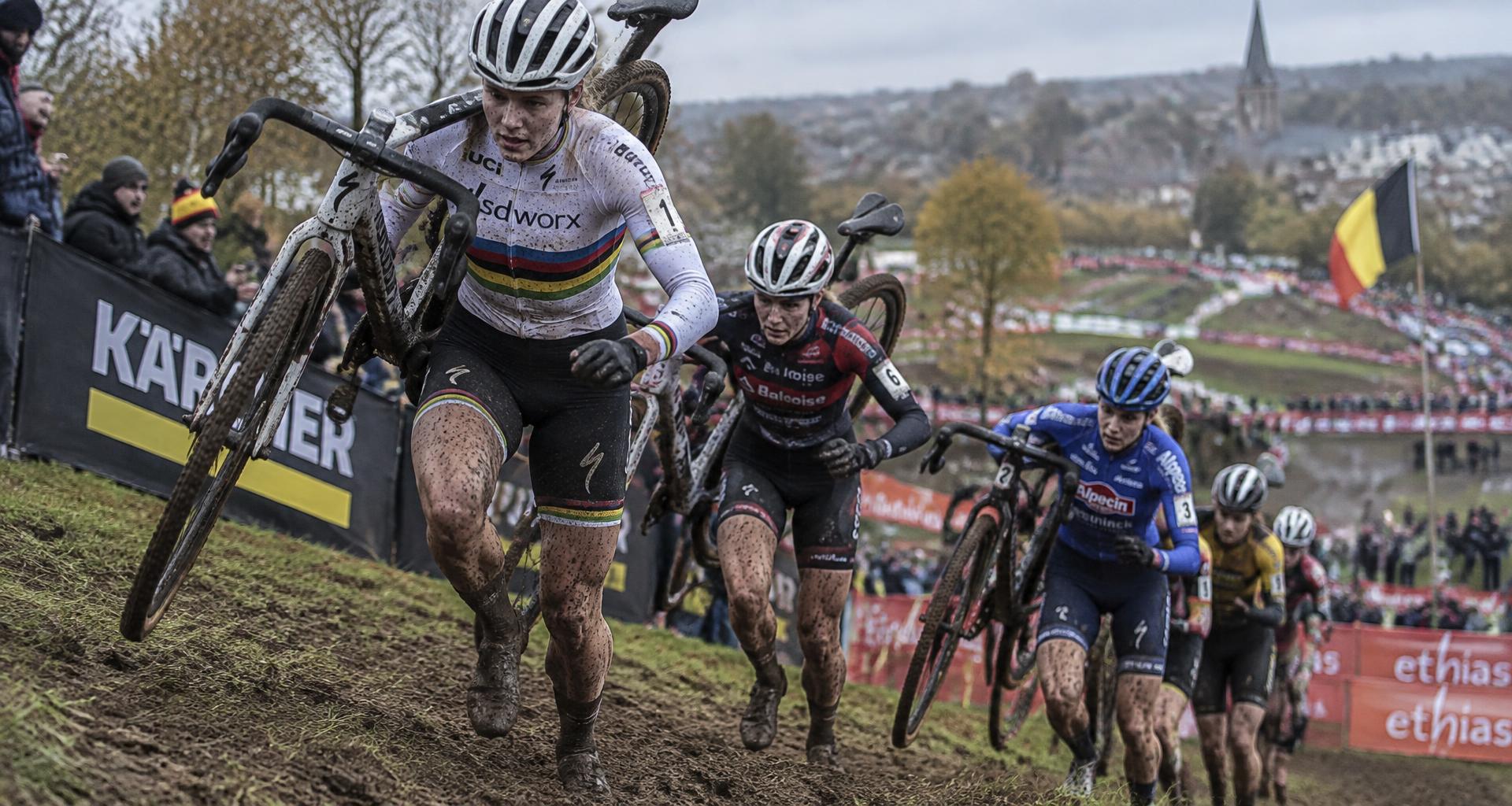 Women's cyclocross riders racing through a muddy off-road course